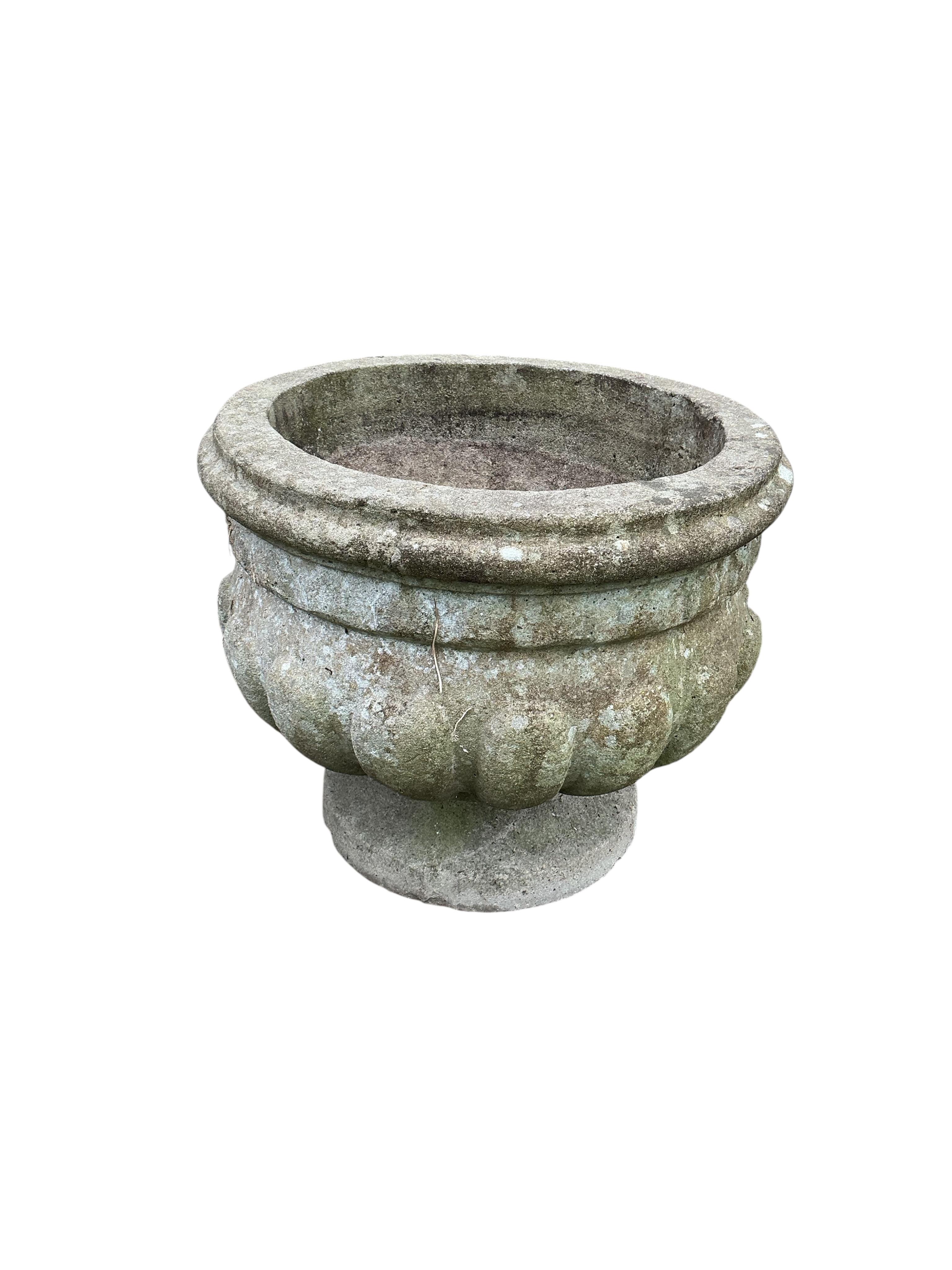 A pair of circular reconstituted stone garden planters, diameter 50cm, height 41cm